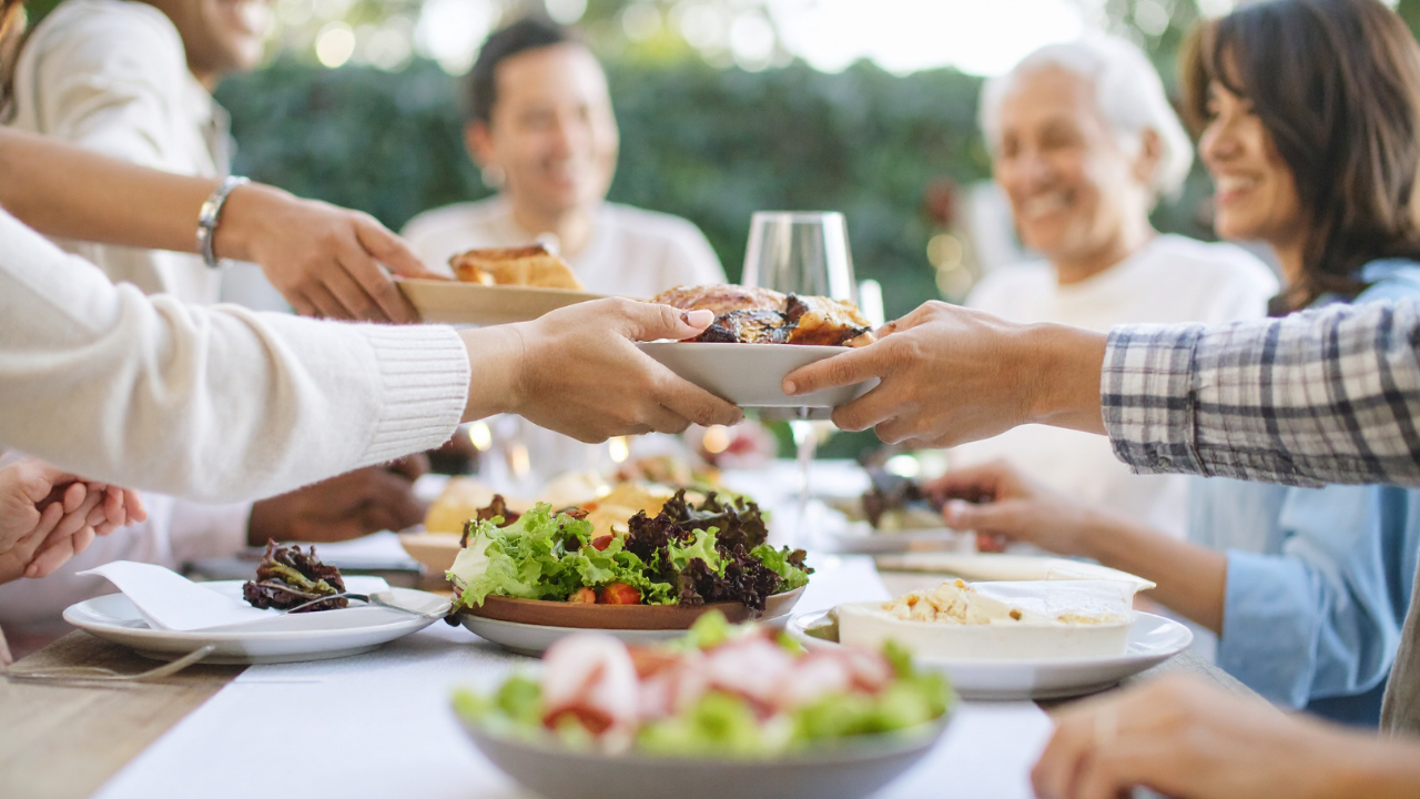 A group of people eating food.