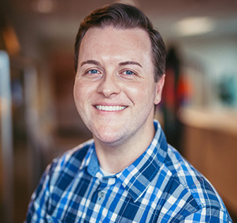 A man smiling for the camera.