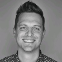 A woman smiling for the camera.