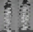 A woman smiling for the camera.