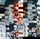 A man smiling for the camera.