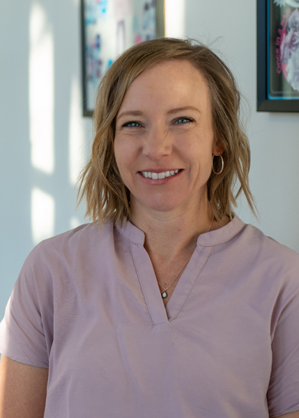 A person smiling for the camera.