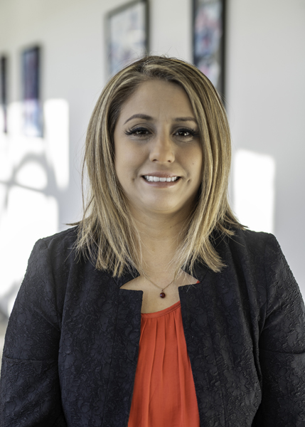 A person smiling for the camera.