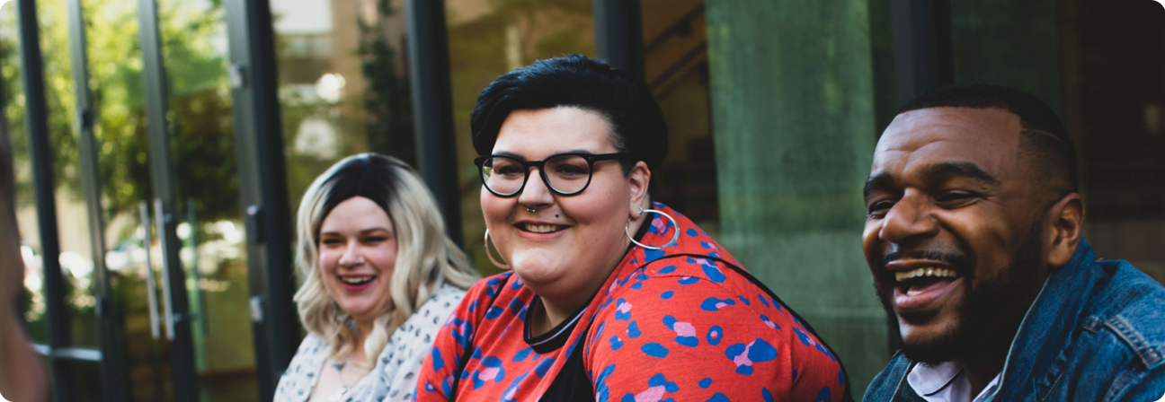 A group of people smiling.