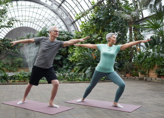 A man and woman exercising.