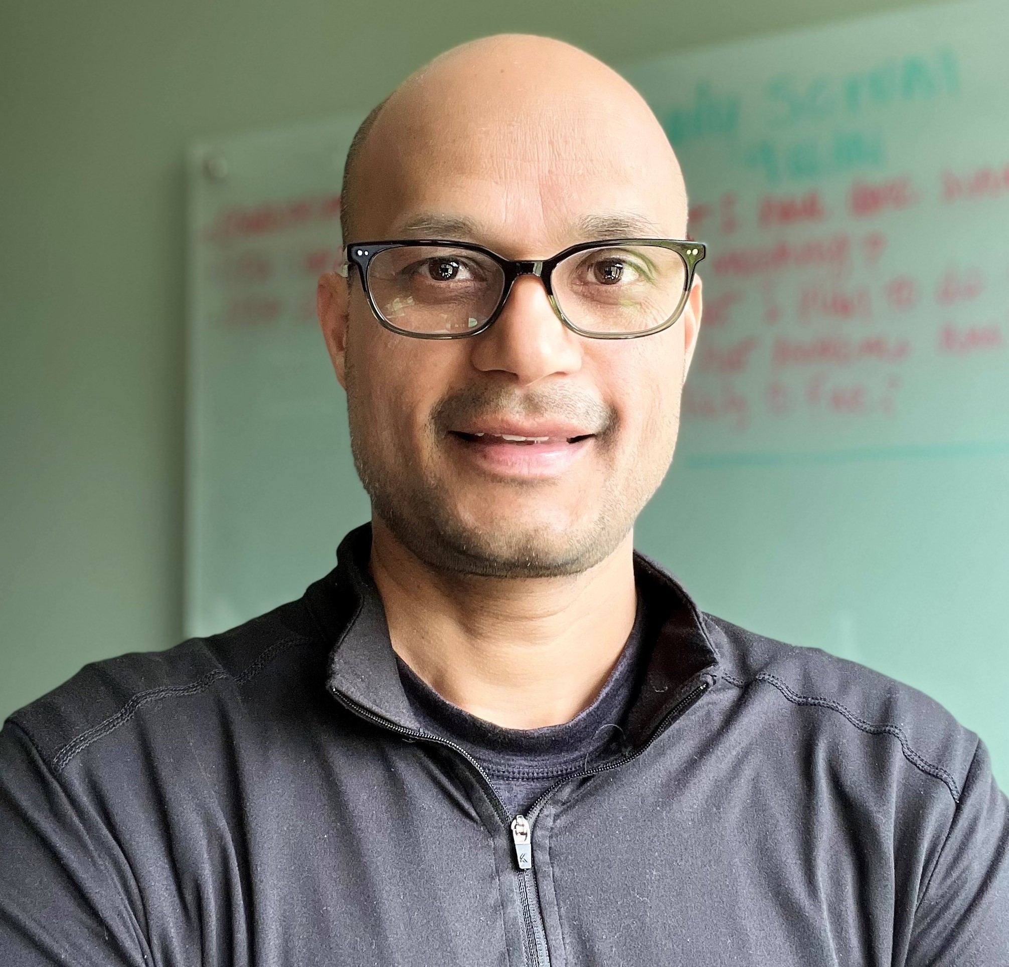 A man wearing glasses.