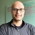 A man wearing glasses.