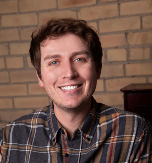 A man smiling for the camera.