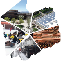A group of men working on a roof.