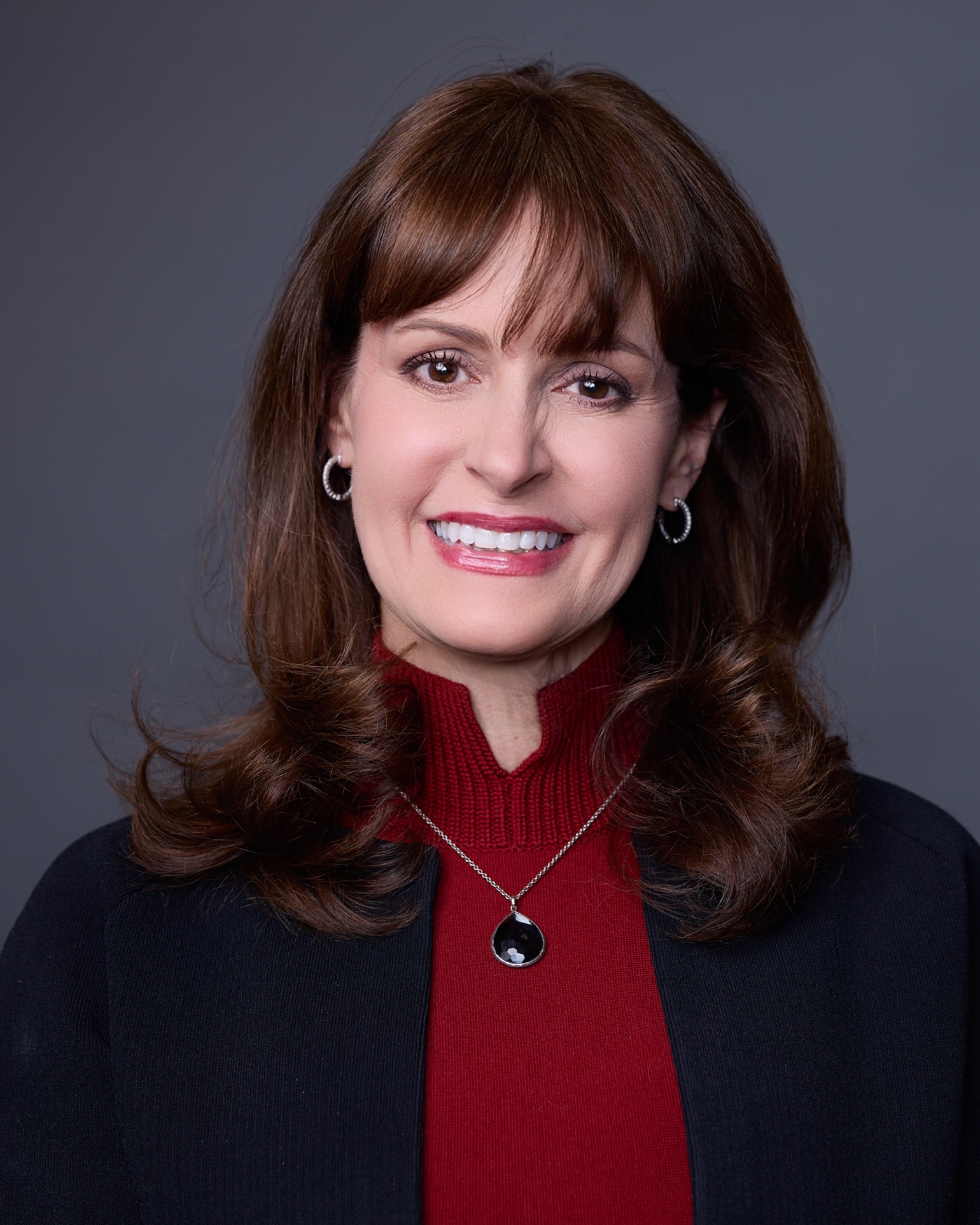 A woman with long hair.