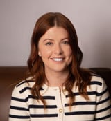 A person smiling for the camera.