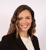 A person smiling for the camera.