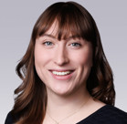 A close-up of a woman smiling.