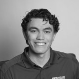 A man smiling for the camera.