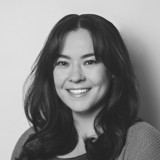 A woman smiling for the camera.