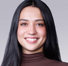 A woman with dark hair.