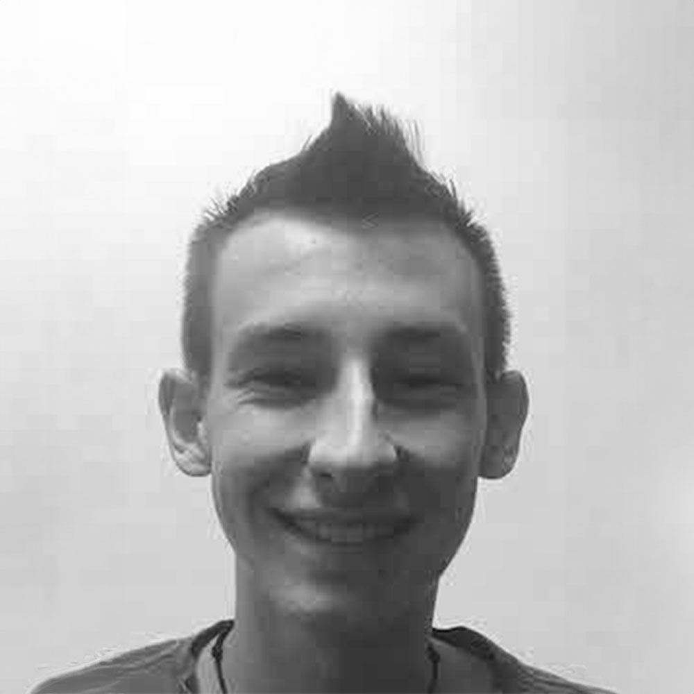 A man smiling for the camera.