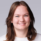 A close-up of a woman smiling.