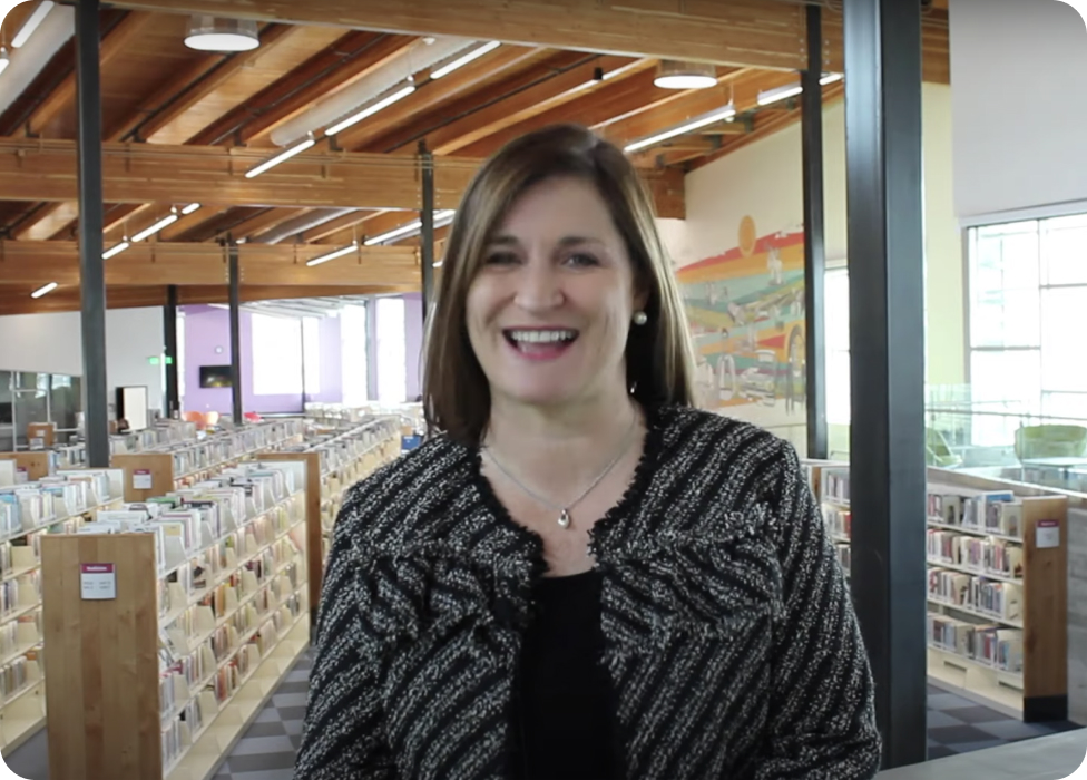 Jenny Wilson in a library.