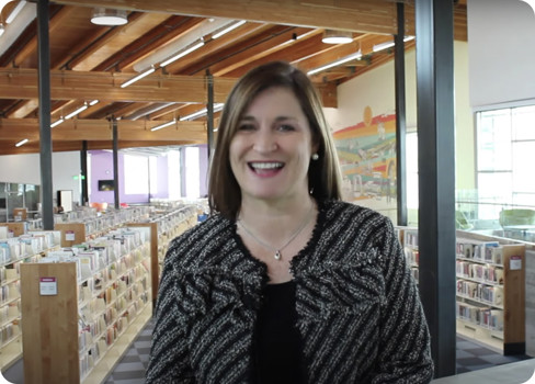 Jenny Wilson in a library.