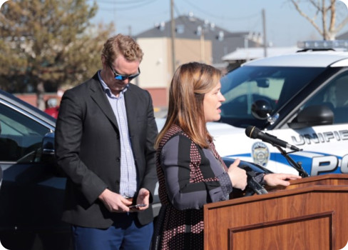 A man and woman talking to each other.