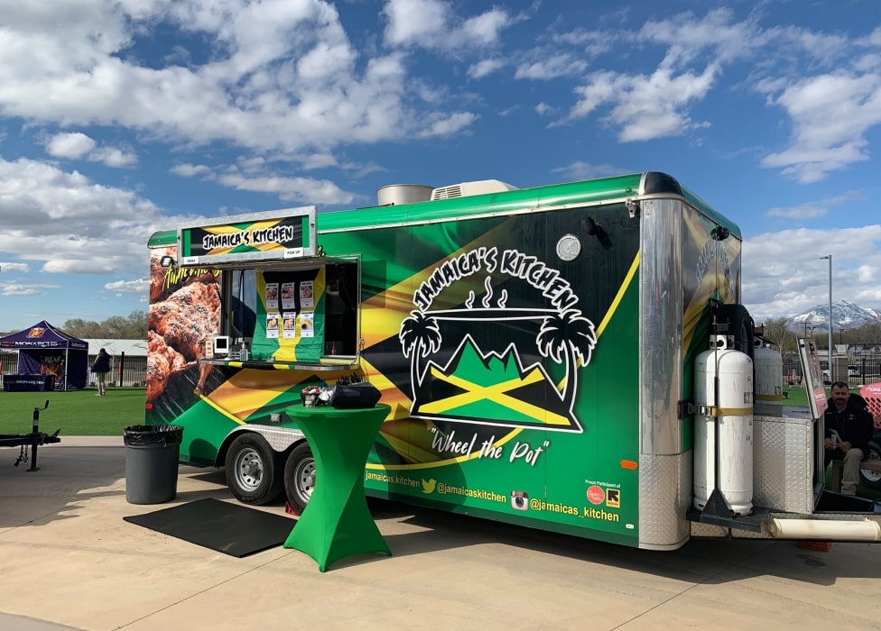 A green food truck.