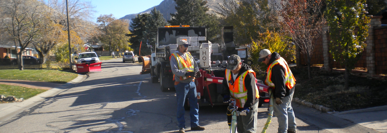 A group of men working on a road.