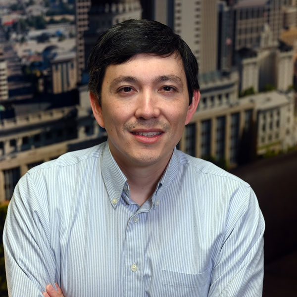 A man smiling for the camera.