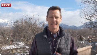 A man smiling for the camera.