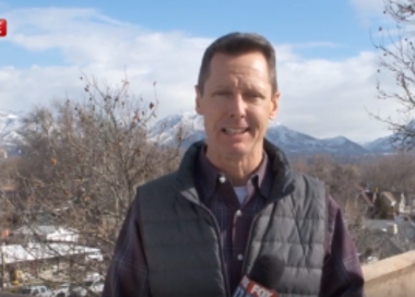 A man smiling for the camera.