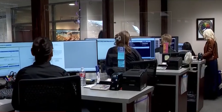 A group of people in an office.