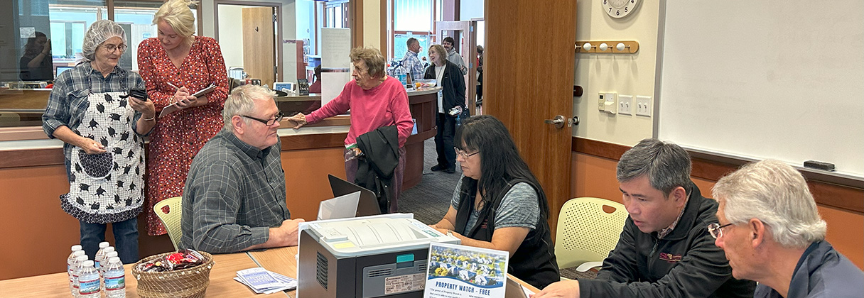 A group of people in a room.