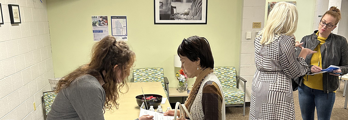 A group of people in a room.