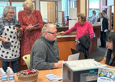 A group of people in a room.