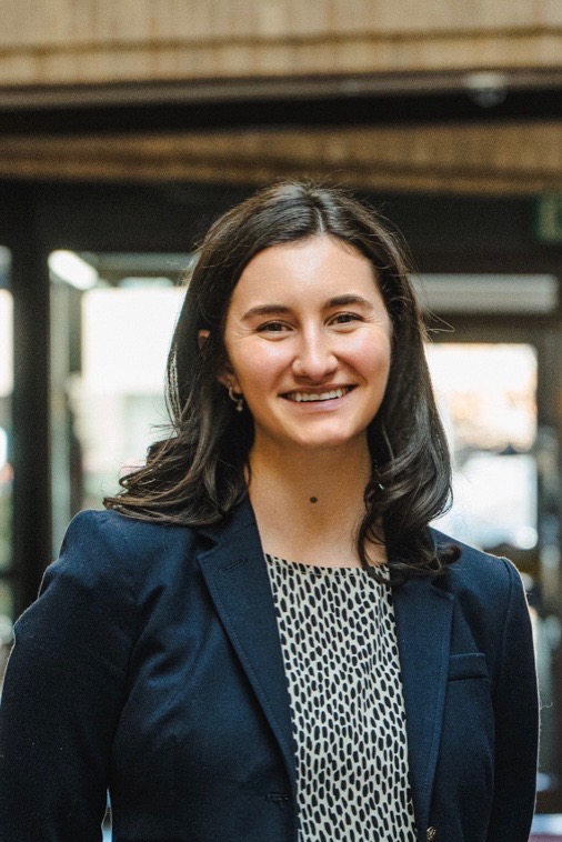 A person smiling for the camera.