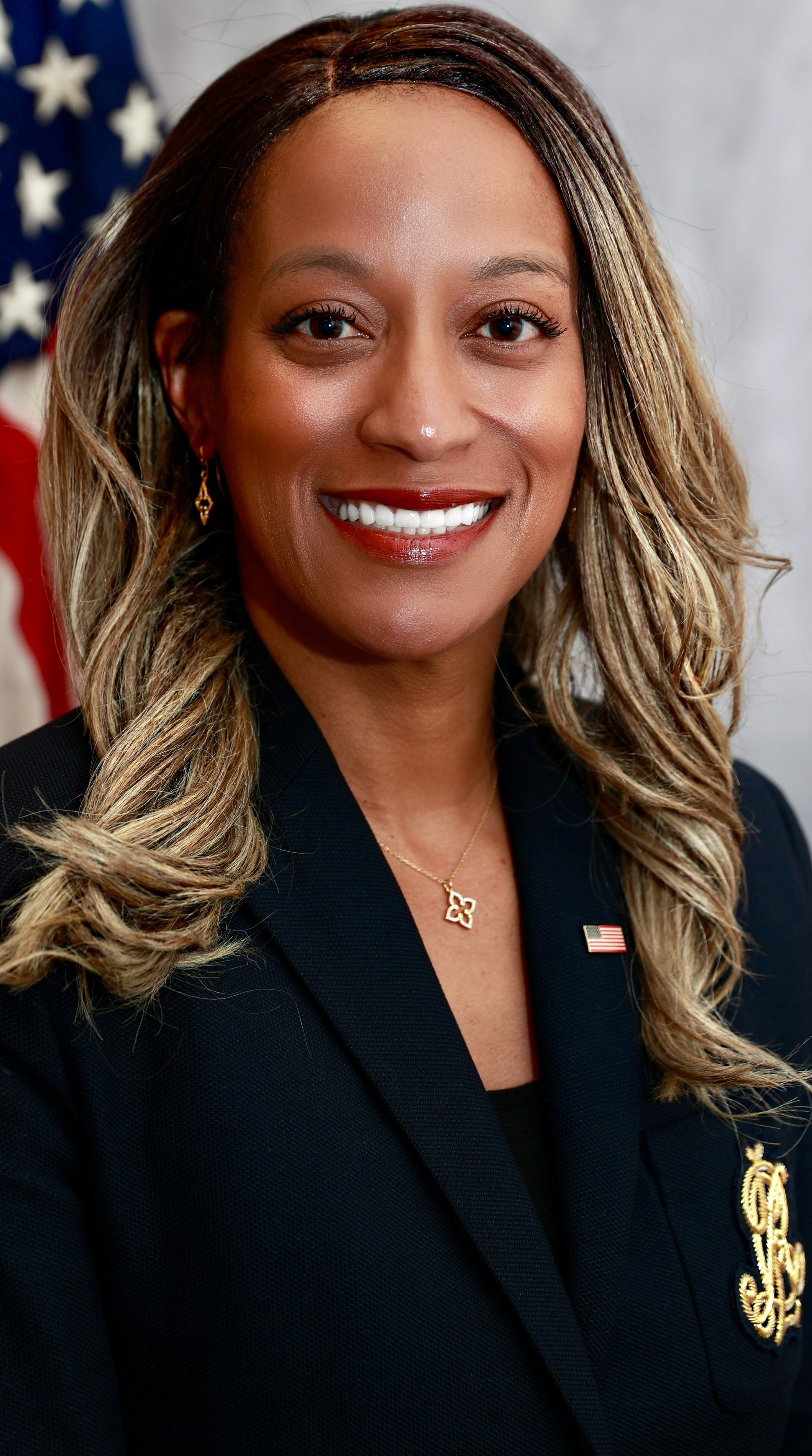 A woman smiling for the camera.