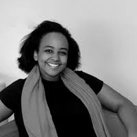 A person smiling for the camera.