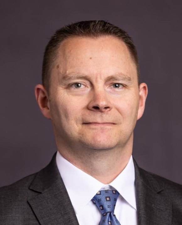 A man in a suit.