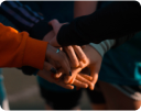 Close-up of people shaking hands.