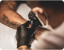 A close-up of a person's arm with a tattoo on it.
