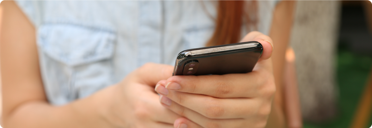 A person holding a cell phone.