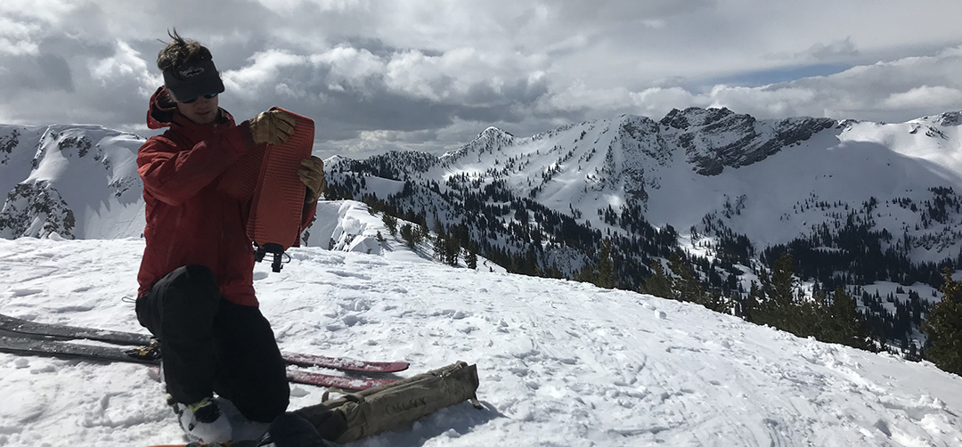 A man on a snowboard.