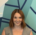 A person smiling for the camera.