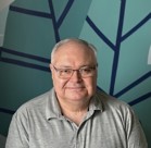 A man wearing glasses.