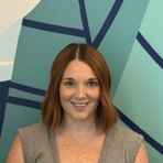 A person smiling for the camera.