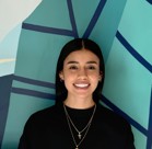 A person smiling for the camera.