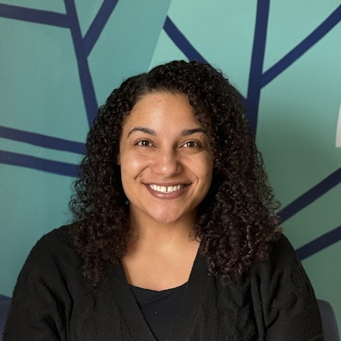 A person with curly hair.