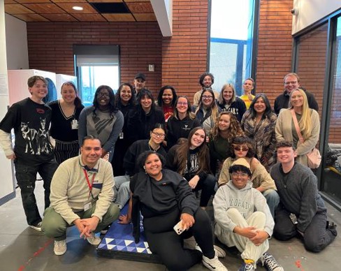 A group of people posing for a photo.