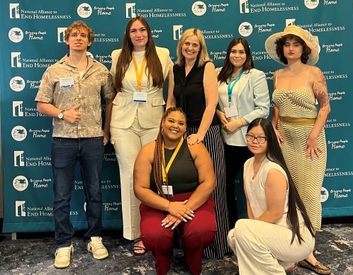 A group of people posing for a photo.