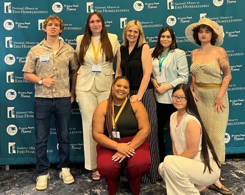 A group of people posing for a photo.